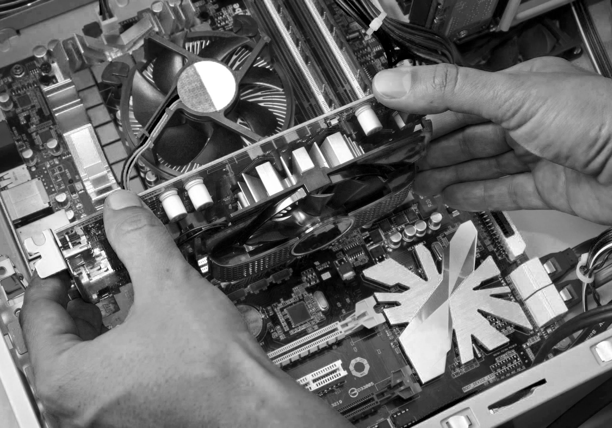 hands working on electronics