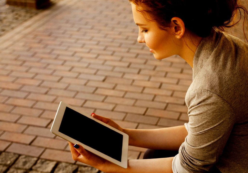 Young lady on wireless device